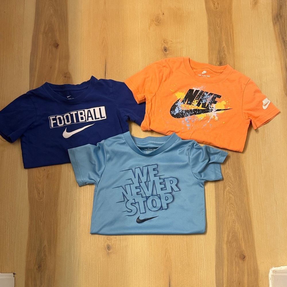 Three Nike Kids' Short Sleeve Tees